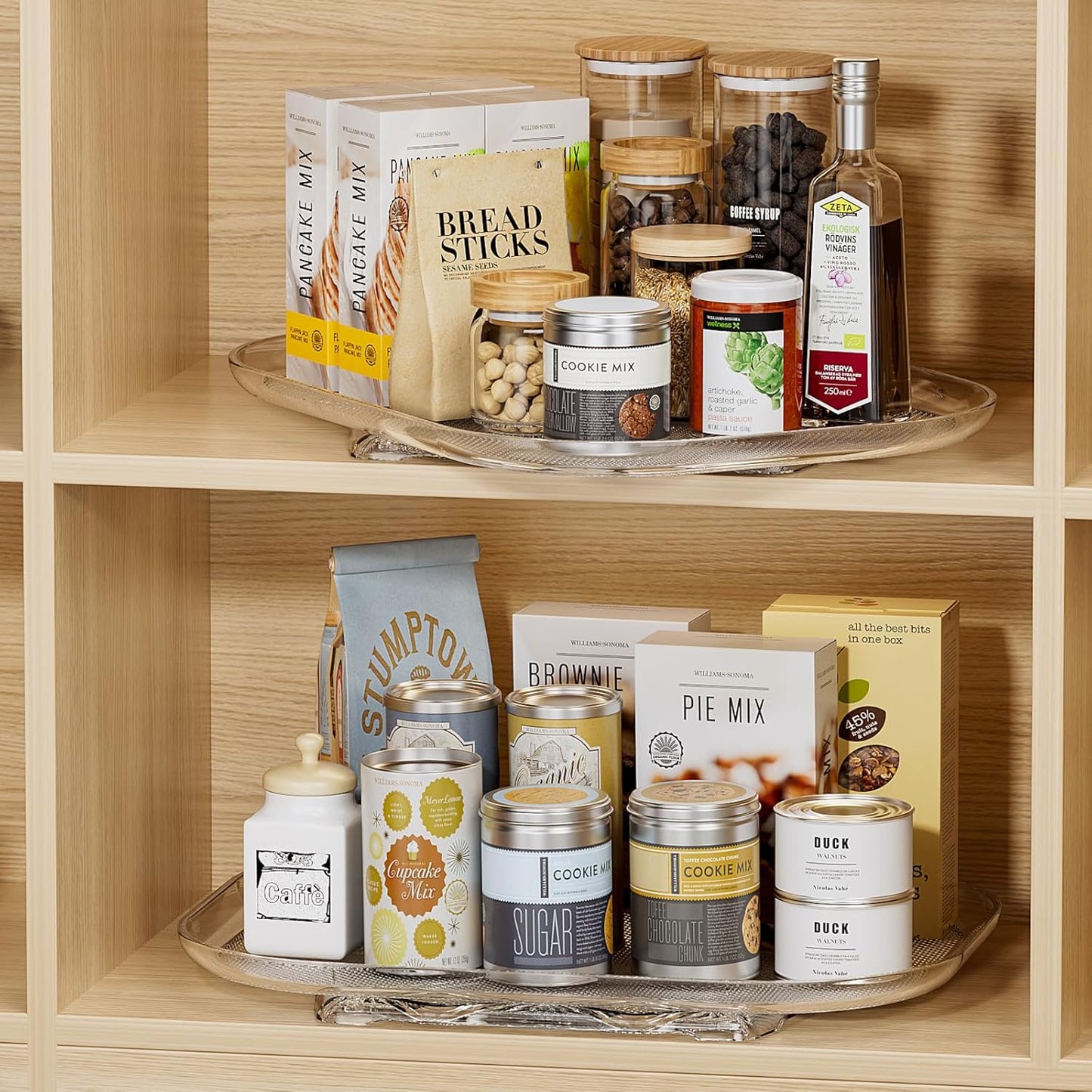 Wooden shelves with various baking ingredients and products on a neutral background
